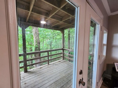 Secluded, private house with view of Sugar Loaf Mountain on Indian Hills Country Club in Arkansas - for sale on GolfHomes.com, golf home, golf lot