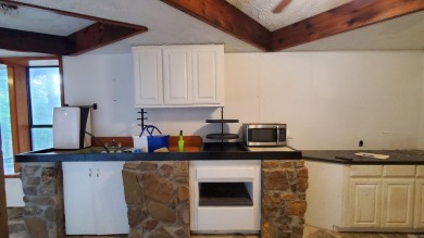 Secluded, private house with view of Sugar Loaf Mountain on Indian Hills Country Club in Arkansas - for sale on GolfHomes.com, golf home, golf lot