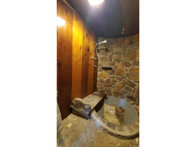 Secluded, private house with view of Sugar Loaf Mountain on Indian Hills Country Club in Arkansas - for sale on GolfHomes.com, golf home, golf lot