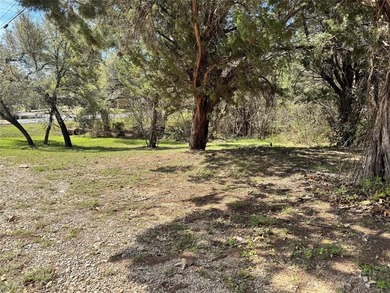 This buildable lot is located in the highly sought-after on De Cordova Bend Country Club in Texas - for sale on GolfHomes.com, golf home, golf lot