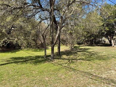 This buildable lot is located in the highly sought-after on De Cordova Bend Country Club in Texas - for sale on GolfHomes.com, golf home, golf lot
