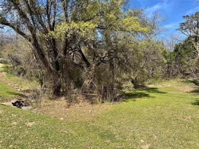 This buildable lot is located in the highly sought-after on De Cordova Bend Country Club in Texas - for sale on GolfHomes.com, golf home, golf lot