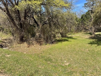 This buildable lot is located in the highly sought-after on De Cordova Bend Country Club in Texas - for sale on GolfHomes.com, golf home, golf lot