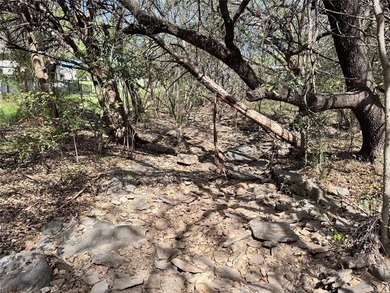 This buildable lot is located in the highly sought-after on De Cordova Bend Country Club in Texas - for sale on GolfHomes.com, golf home, golf lot