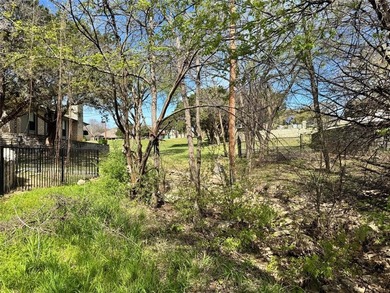 This buildable lot is located in the highly sought-after on De Cordova Bend Country Club in Texas - for sale on GolfHomes.com, golf home, golf lot