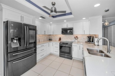 Located within a beautiful gated Belleair community, surrounding on Belleair Country Club in Florida - for sale on GolfHomes.com, golf home, golf lot