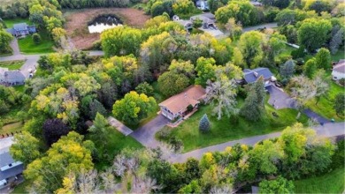 Discover your private retreat in this charming rambler on Forest Hills Golf Club in Minnesota - for sale on GolfHomes.com, golf home, golf lot