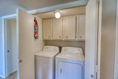 Welcome to this charming single-level townhome at Escape West in on Apple Rock Golf Course - Horseshoe Bay in Texas - for sale on GolfHomes.com, golf home, golf lot