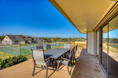 Welcome to this charming single-level townhome at Escape West in on Apple Rock Golf Course - Horseshoe Bay in Texas - for sale on GolfHomes.com, golf home, golf lot