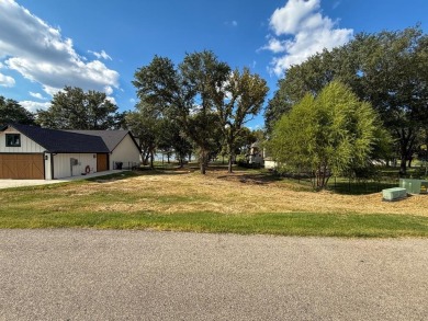 Open water lot on almost half acre in newer gated community on on Cedar Creek Country Club in Texas - for sale on GolfHomes.com, golf home, golf lot