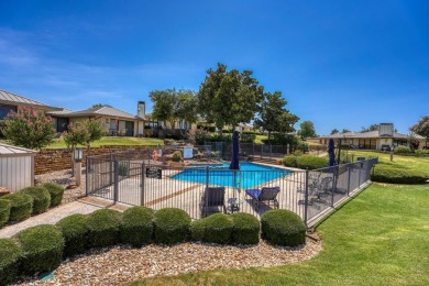 Welcome to this charming single-level townhome at Escape West in on Apple Rock Golf Course - Horseshoe Bay in Texas - for sale on GolfHomes.com, golf home, golf lot