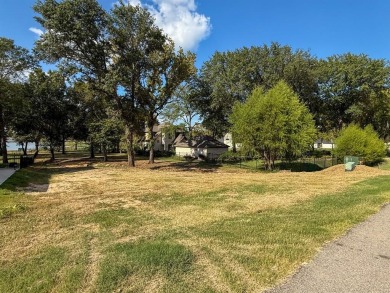 Open water lot on almost half acre in newer gated community on on Cedar Creek Country Club in Texas - for sale on GolfHomes.com, golf home, golf lot