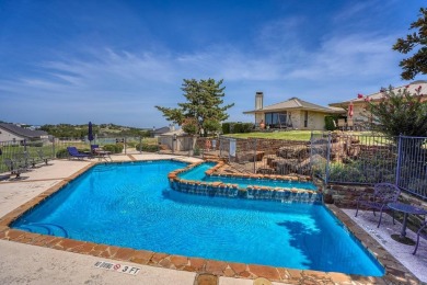 Welcome to this charming single-level townhome at Escape West in on Apple Rock Golf Course - Horseshoe Bay in Texas - for sale on GolfHomes.com, golf home, golf lot