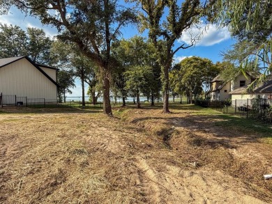 Open water lot on almost half acre in newer gated community on on Cedar Creek Country Club in Texas - for sale on GolfHomes.com, golf home, golf lot