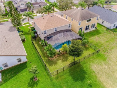 Welcome to this recently updated 4-bedroom, 3-bathroom pool home on Eagle Creek Golf Club in Florida - for sale on GolfHomes.com, golf home, golf lot