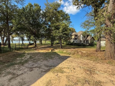 Open water lot on almost half acre in newer gated community on on Cedar Creek Country Club in Texas - for sale on GolfHomes.com, golf home, golf lot