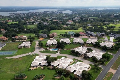 Welcome to this charming single-level townhome at Escape West in on Apple Rock Golf Course - Horseshoe Bay in Texas - for sale on GolfHomes.com, golf home, golf lot