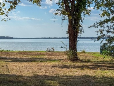 Open water lot on almost half acre in newer gated community on on Cedar Creek Country Club in Texas - for sale on GolfHomes.com, golf home, golf lot
