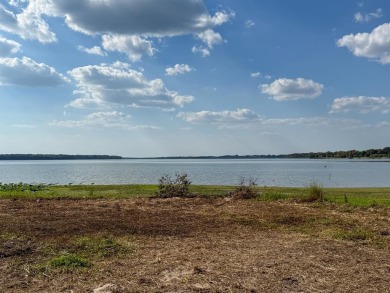 Open water lot on almost half acre in newer gated community on on Cedar Creek Country Club in Texas - for sale on GolfHomes.com, golf home, golf lot