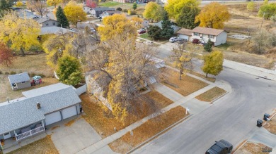 Welcome to this charming four-bedroom, two-bath home in on YMCA Golf Course in South Dakota - for sale on GolfHomes.com, golf home, golf lot