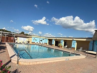 One or more photo(s) has been virtually staged. Discover your on Sabal Trace Golf and Country Club in Florida - for sale on GolfHomes.com, golf home, golf lot