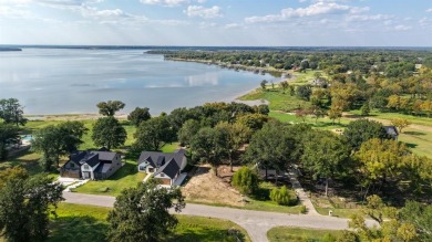 Open water lot on almost half acre in newer gated community on on Cedar Creek Country Club in Texas - for sale on GolfHomes.com, golf home, golf lot