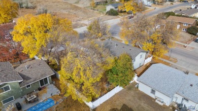 Welcome to this charming four-bedroom, two-bath home in on YMCA Golf Course in South Dakota - for sale on GolfHomes.com, golf home, golf lot