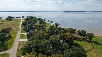 Open water lot on almost half acre in newer gated community on on Cedar Creek Country Club in Texas - for sale on GolfHomes.com, golf home, golf lot