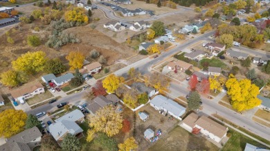 Welcome to this charming four-bedroom, two-bath home in on YMCA Golf Course in South Dakota - for sale on GolfHomes.com, golf home, golf lot