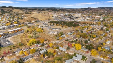 Welcome to this charming four-bedroom, two-bath home in on YMCA Golf Course in South Dakota - for sale on GolfHomes.com, golf home, golf lot