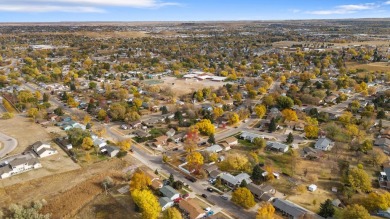 Welcome to this charming four-bedroom, two-bath home in on YMCA Golf Course in South Dakota - for sale on GolfHomes.com, golf home, golf lot