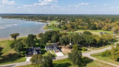Open water lot on almost half acre in newer gated community on on Cedar Creek Country Club in Texas - for sale on GolfHomes.com, golf home, golf lot