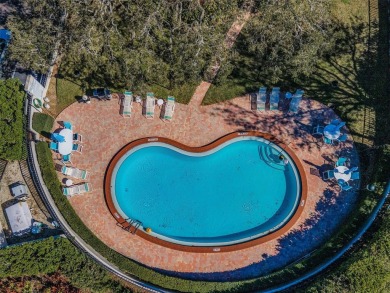 Located within a beautiful gated Belleair community, surrounding on Belleair Country Club in Florida - for sale on GolfHomes.com, golf home, golf lot