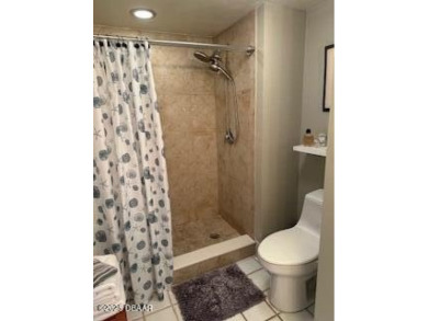 Coastal Luxury at Oceans Three - 3-Bed, 3-Bath Condo with on Oceans Golf Club in Florida - for sale on GolfHomes.com, golf home, golf lot