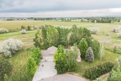 Welcome to your dream home in Idaho Falls! This beautifully on Sage Lakes Municipal Golf Course in Idaho - for sale on GolfHomes.com, golf home, golf lot