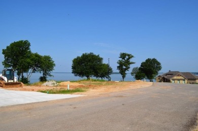 Beautiful sunsets and open water views from this corner lot on Cedar Creek Country Club in Texas - for sale on GolfHomes.com, golf home, golf lot