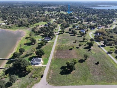 Beautiful sunsets and open water views from this corner lot on Cedar Creek Country Club in Texas - for sale on GolfHomes.com, golf home, golf lot