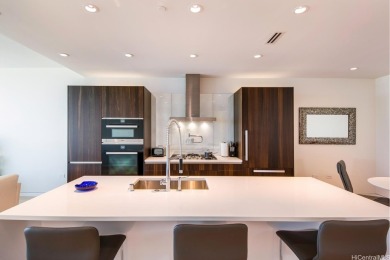 Unit #1203 is a generously proportioned 1-bedroom, 2-bathroom on Ala Wai Golf Course in Hawaii - for sale on GolfHomes.com, golf home, golf lot