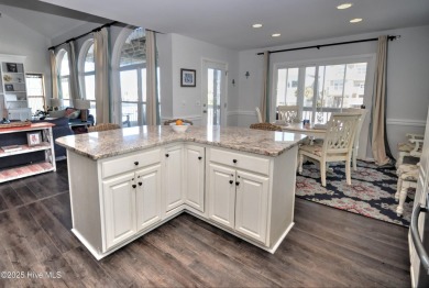 Treat yourself to this 5BR/4.5BA canal home that would serve on Sea Trail Golf Resort in North Carolina - for sale on GolfHomes.com, golf home, golf lot