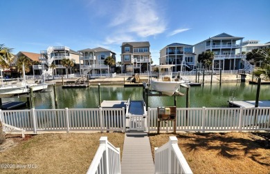 Treat yourself to this 5BR/4.5BA canal home that would serve on Sea Trail Golf Resort in North Carolina - for sale on GolfHomes.com, golf home, golf lot