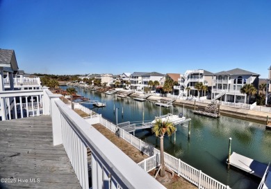 Treat yourself to this 5BR/4.5BA canal home that would serve on Sea Trail Golf Resort in North Carolina - for sale on GolfHomes.com, golf home, golf lot