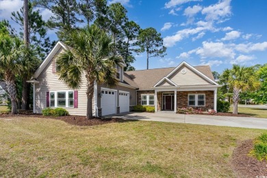 Step into luxury and comfort with this stunning executive-style on Wild Wing Plantation in South Carolina - for sale on GolfHomes.com, golf home, golf lot