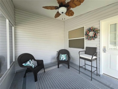 Fantastic location for this Villa in The Villages -- just on The Links of Spruce Creek in Florida - for sale on GolfHomes.com, golf home, golf lot