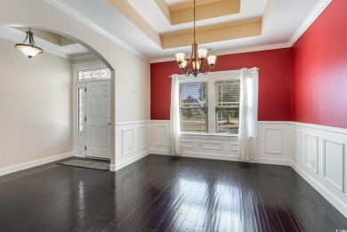 Step into luxury and comfort with this stunning executive-style on Wild Wing Plantation in South Carolina - for sale on GolfHomes.com, golf home, golf lot
