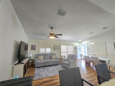 Fantastic location for this Villa in The Villages -- just on The Links of Spruce Creek in Florida - for sale on GolfHomes.com, golf home, golf lot