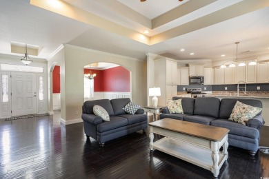 Step into luxury and comfort with this stunning executive-style on Wild Wing Plantation in South Carolina - for sale on GolfHomes.com, golf home, golf lot