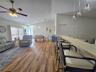 Fantastic location for this Villa in The Villages -- just on The Links of Spruce Creek in Florida - for sale on GolfHomes.com, golf home, golf lot
