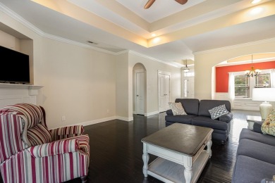 Step into luxury and comfort with this stunning executive-style on Wild Wing Plantation in South Carolina - for sale on GolfHomes.com, golf home, golf lot