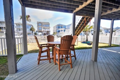 Treat yourself to this 5BR/4.5BA canal home that would serve on Sea Trail Golf Resort in North Carolina - for sale on GolfHomes.com, golf home, golf lot