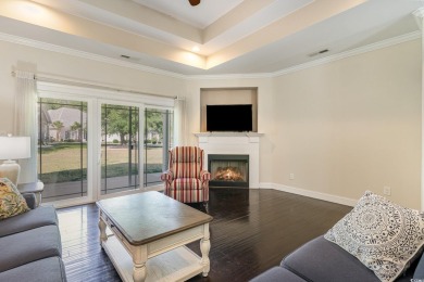 Step into luxury and comfort with this stunning executive-style on Wild Wing Plantation in South Carolina - for sale on GolfHomes.com, golf home, golf lot